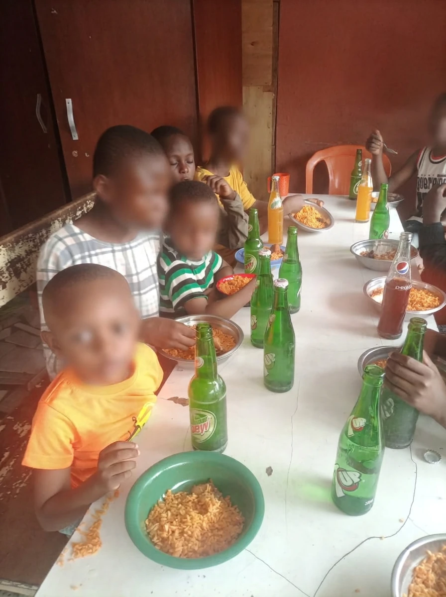 Children sharing a meal together at an outreach event