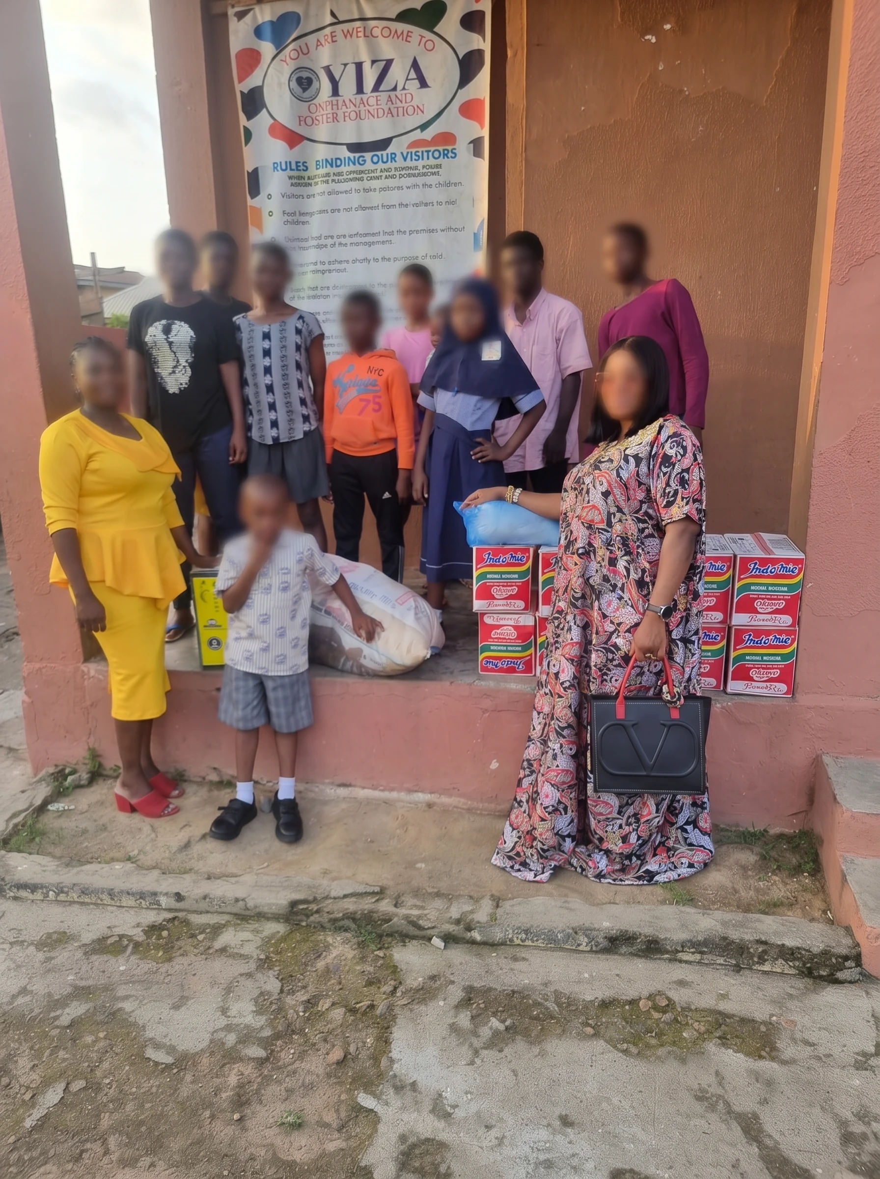 Volunteers delivering food supplies to an orphanage